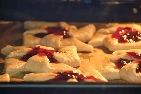 Plum puff pastry from Finland joulutorttu in the oven Stock Photos