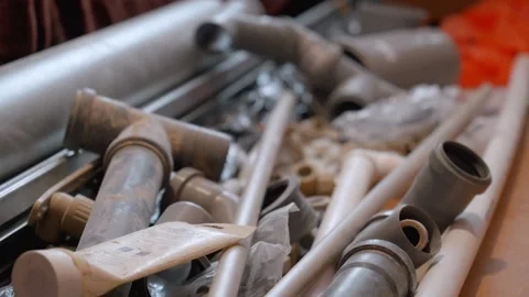 Plumber assembling pvc pipes for water supply system Stock Footage 297465301