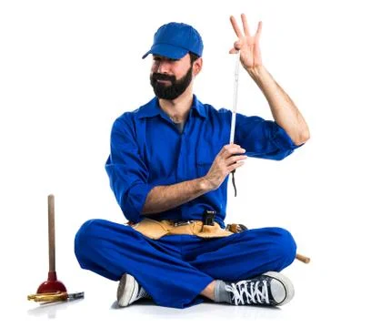 Plumber with bevel mower Stock Photos