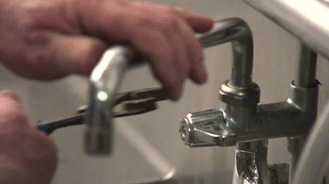 Plumber Changing Faucet Stock Footage 50735312