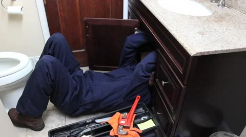 Plumber Fixes Bathroom Sink 1 Video stock 44862015