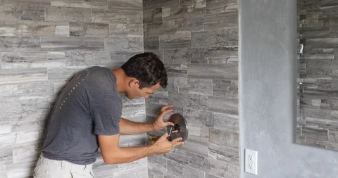 Plumber fixing shower. Workman repairing shower in bathroom. Stock Footage 120670514