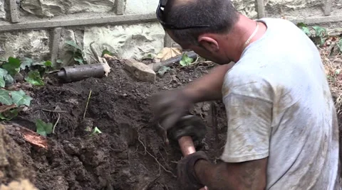 Plumber in hole cutting Stock Footage 30387069