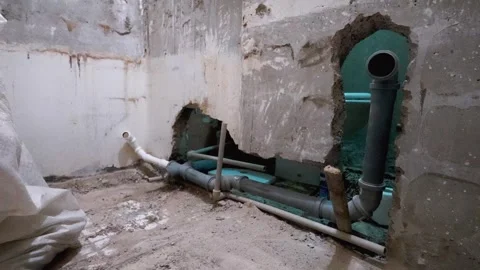 Plumber installing modern water pipes system Stock Footage 297463310