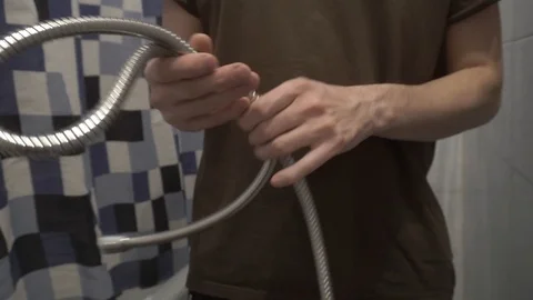 Plumber with shower hose Stock Footage 108307880