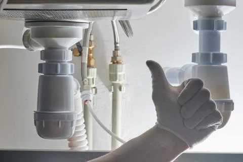 Plumber thumb up Stock Photos