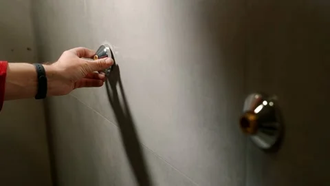 The plumber twists the decorative elements onto the water sockets. Stock-Footage 150138050