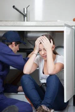 Plumber work exhausted Stock Photos