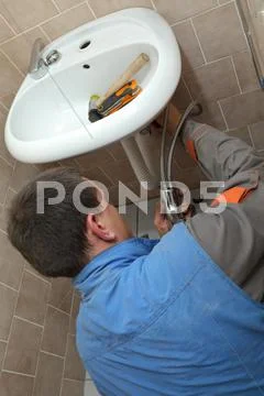 Plumber work Stock Photos