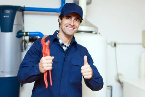Plumber at work Stock Photos