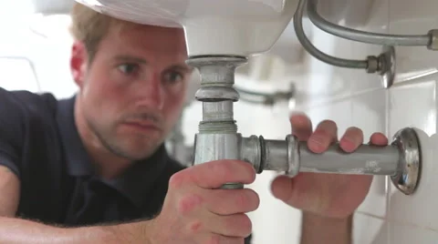 Plumber Working On Sink Stock Footage 51299862