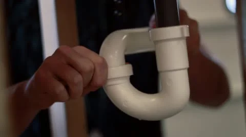 Plumber working on sink pipes 스톡 동영상 10603123