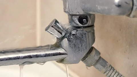 Plumbers concept. Water leak, old damaged bathroom faucet, close-up. Covered  스톡 동영상 149754796