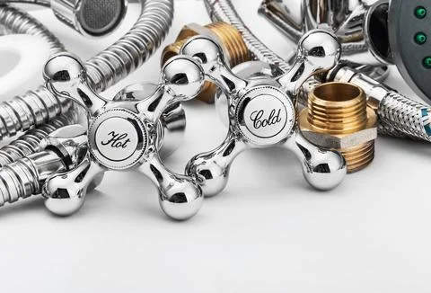 Plumbing and tools in a light background Stock Photos