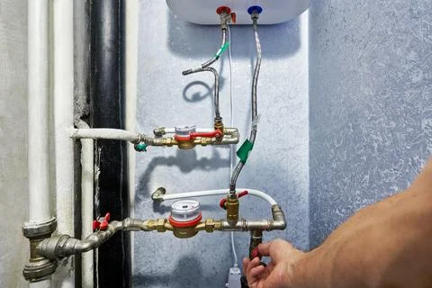Plumbing configuration demonstrates compact utility hardware integration co.. Stock Photos
