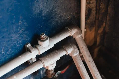 Plumbing system in a car workshop. Stock Photos