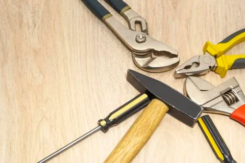 Plumbing tools on the table with advertising space. Stock Photos