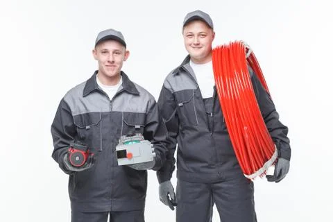 Plumbing tools two man Stock Photos