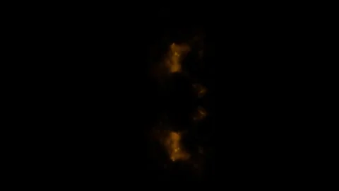 A Plume of Orange Fire and Its Reflection Billows Against a Black Background Stock Footage 270310244