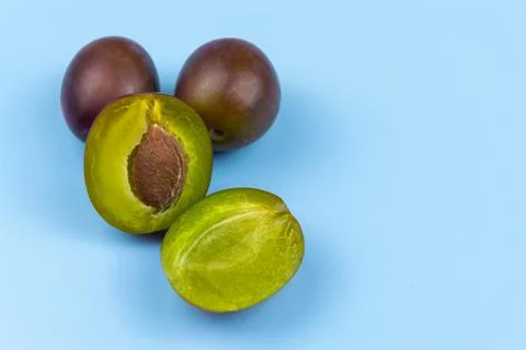 Plums on a blue background Foto stock