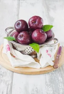 Plums in a colander Stock Photos