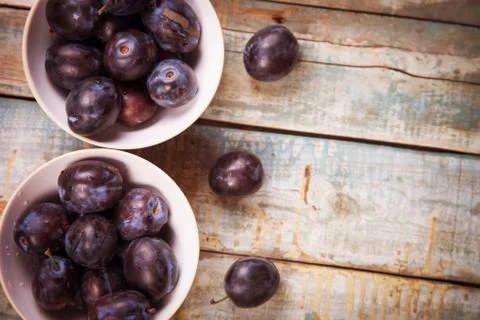 Plums in dish Stock Photos