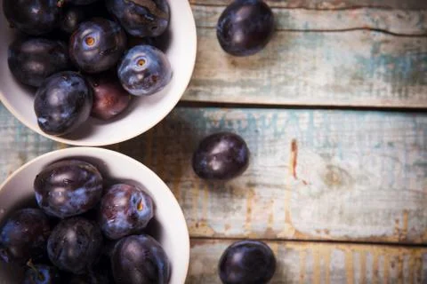 Plums in dish Stock Photos