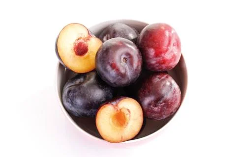 Plums, halved Stock Photos