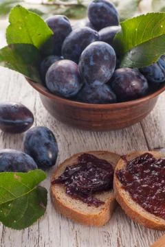 Plums with jam Stock Photos