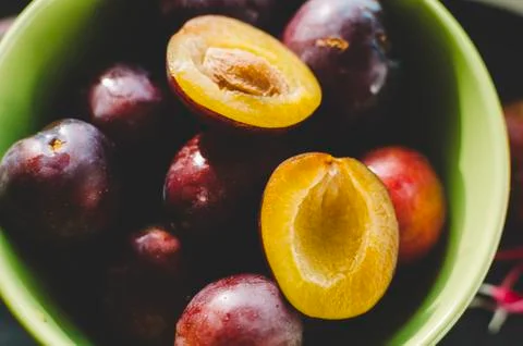 Plums In Plate Stock Photos