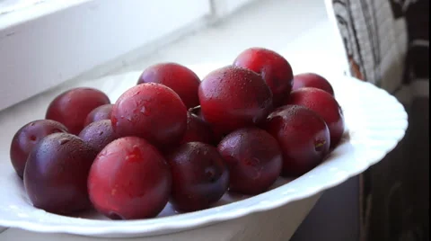 Plums On The White Plate Stock Footage 65402962