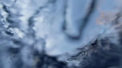 Plunged under Ice in Flowing River Frozen Shelf Stock Footage 12621682