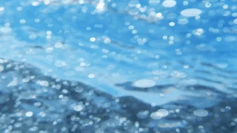 Plunging into the waves, fast air bubbles rising Stock Footage 83484865