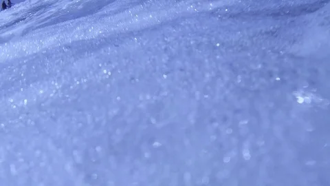 Plunging into the waves, fast air bubbles rising Stock Footage 83486869