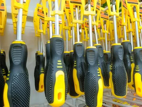 Plus Screwdriver Tools Displayed On Minimarket Shelves Stock Photos