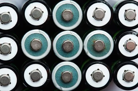 Plus sign from AA size battery Stock Photos