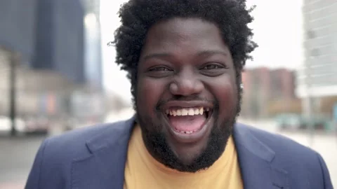 Plus size African man smiling on camera outdoor Stock Footage 201693583