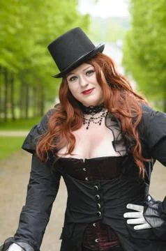 Plus size with black top-hat Stock Photos