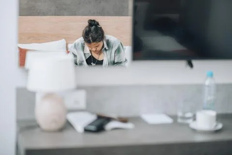 Plus-size freelancer working intently on her project, reflecting the balance of Stock Photos
