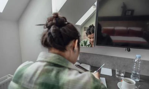 Plus-size freelancer working intently on her project, reflecting the balance of Stock Photos