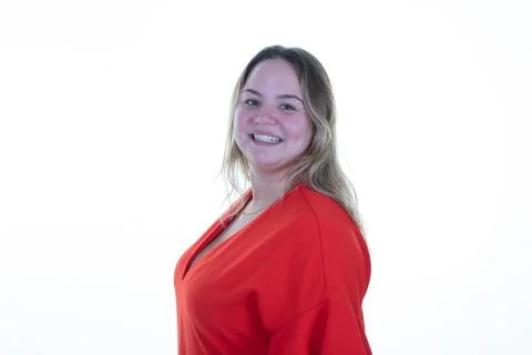 Plus size model blond smiling woman portrait red shirt on white background Stock Photos