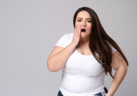 Plus Size Model with a hand holding a sore tooth Stock Photos