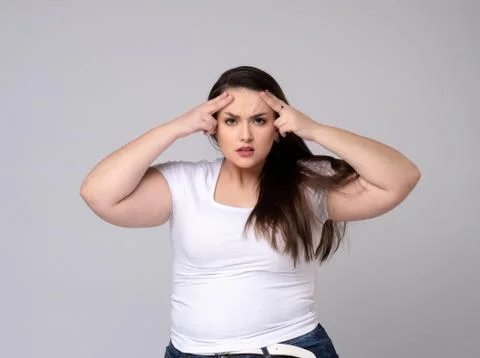 Plus Size Model With Headache Stock Photos