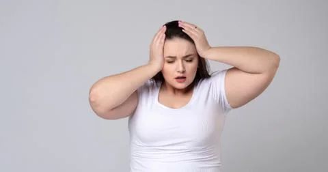 Plus Size Model With Headache Stock Photos