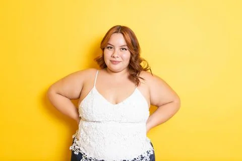 Plus size redhead young woman modeling with smile. overweight model Stock Photos