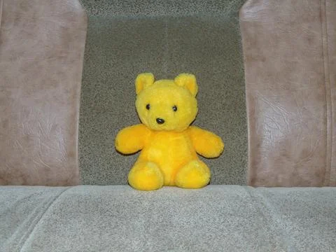 Plush bear on a sofa Foto stock