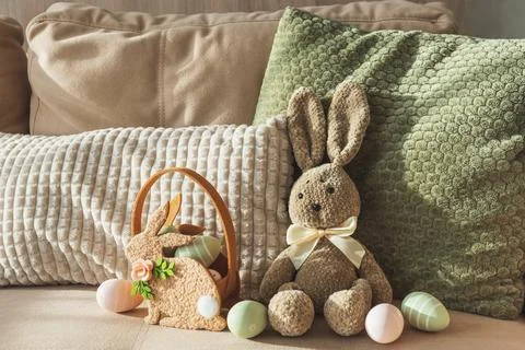Plush Bunny with Easter Basket and Eggs. Cozy Easter Decoration Stock Photos