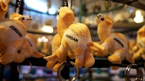 Plush camel keychains with Jordan text souvenir Stock Photos