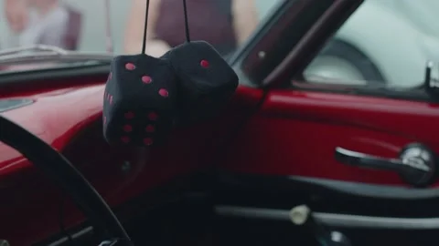 Plush Dice in Window of Red Car Vídeos de archivo 230199646