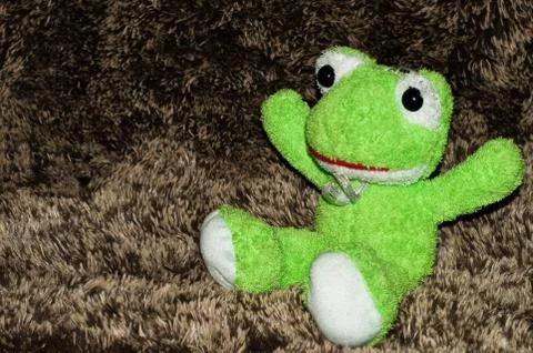 Plush green frog Stock Photos